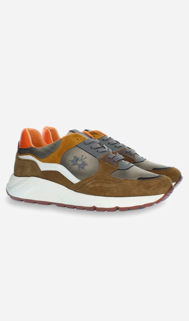 Brown and orange sneakers on a white background