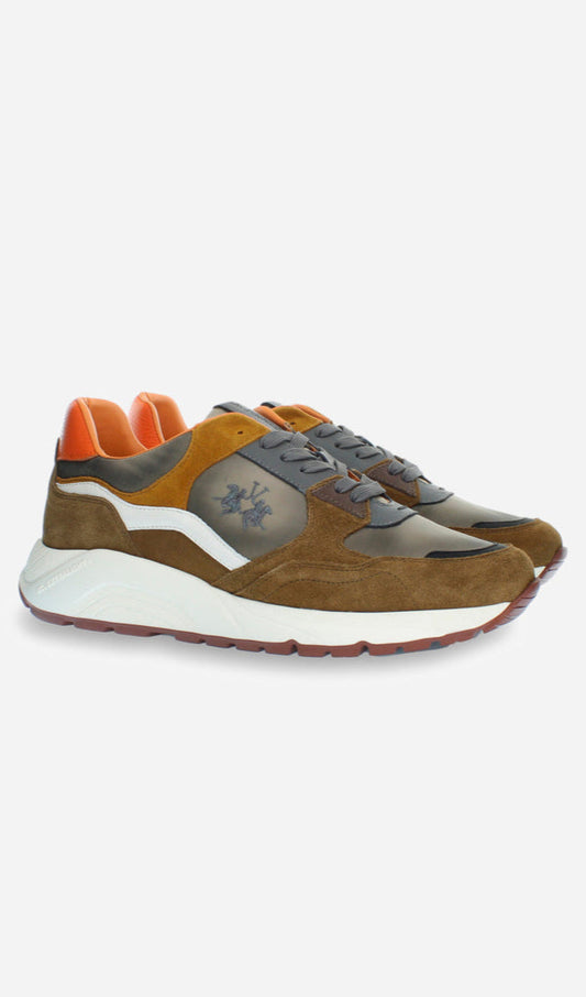 Brown and orange sneakers on a white background